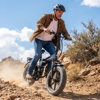 Adult man riding Deepower A5 folding fat tire electric bike on rocky trail